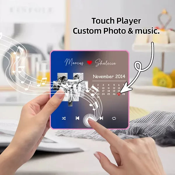 Close-up of the play button on a custom music fridge magnet featuring a personal photo