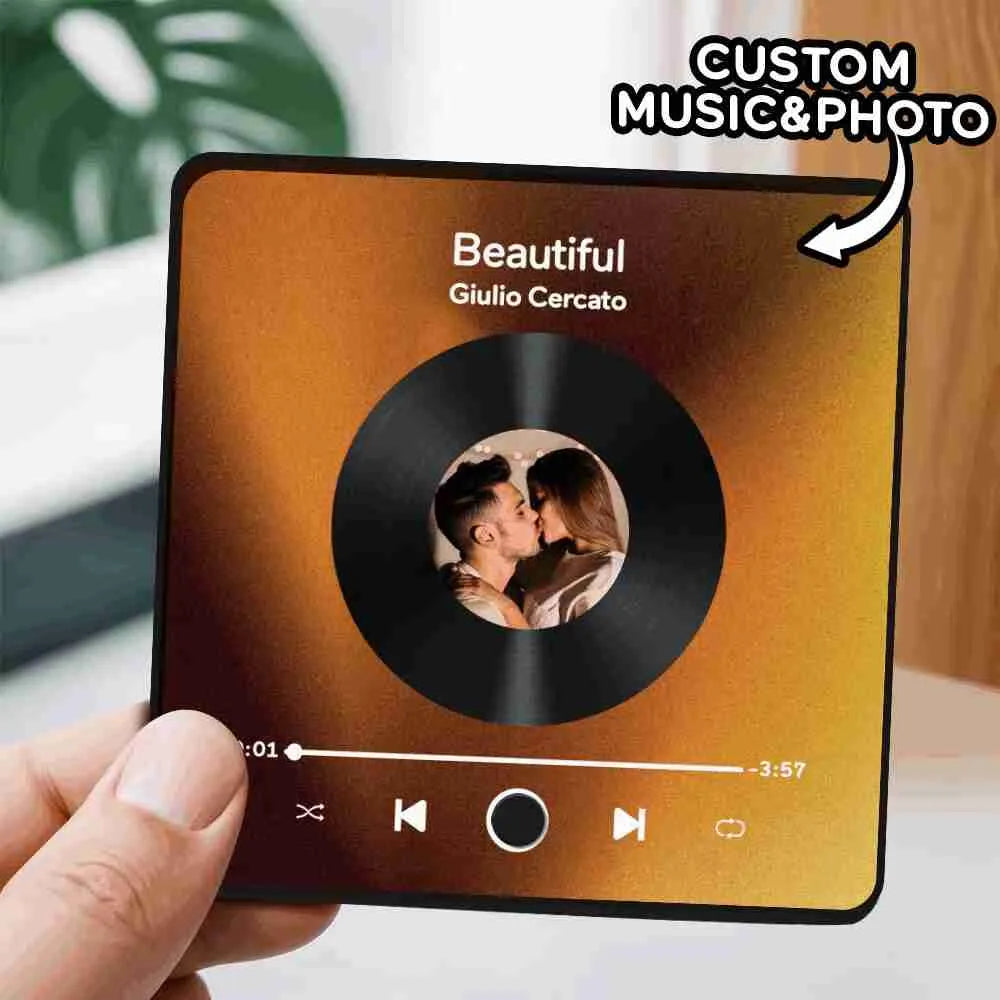 Music fridge magnet scanned to play a personalized song