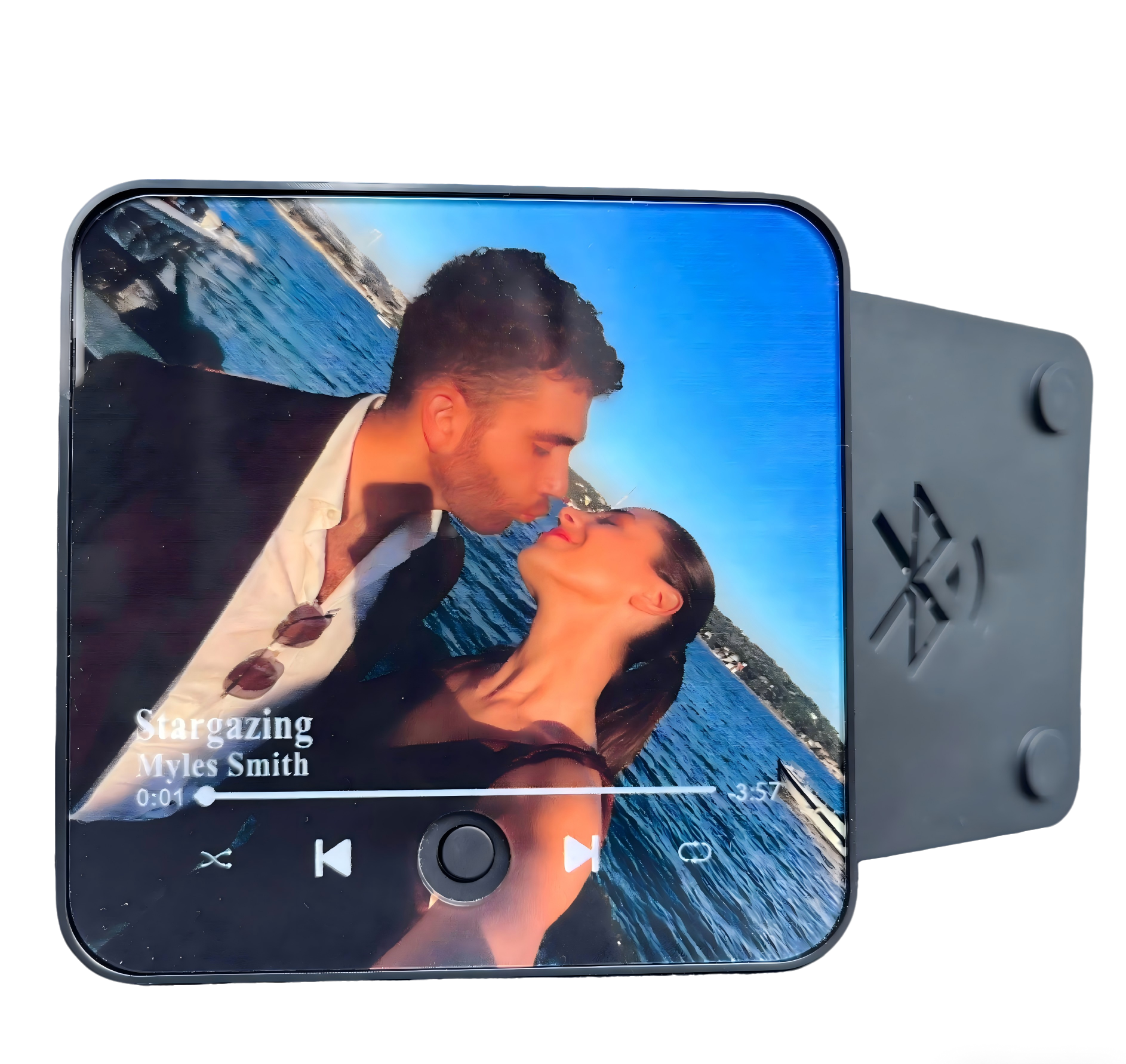 A customized musical refrigerator magnet displaying a personal photo.